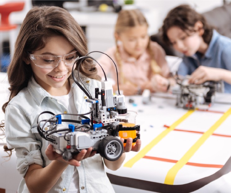 Students working with robotics